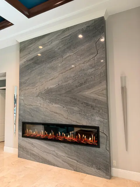 Front view of the granite wall and linear fireplace